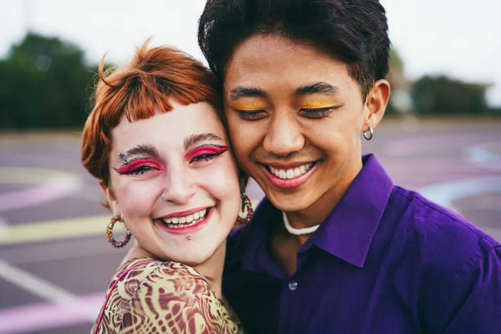 Two happy teens after transgender teen therapy