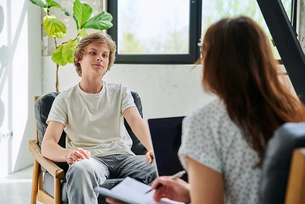 Mental health professional supporting a teen with bipolar disorder and substance use disorder.