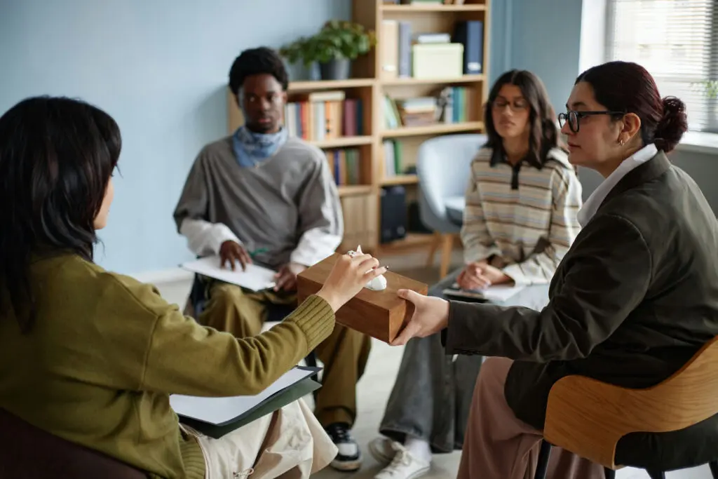Teen receiving outpatient mental health treatment in a therapeutic setting
