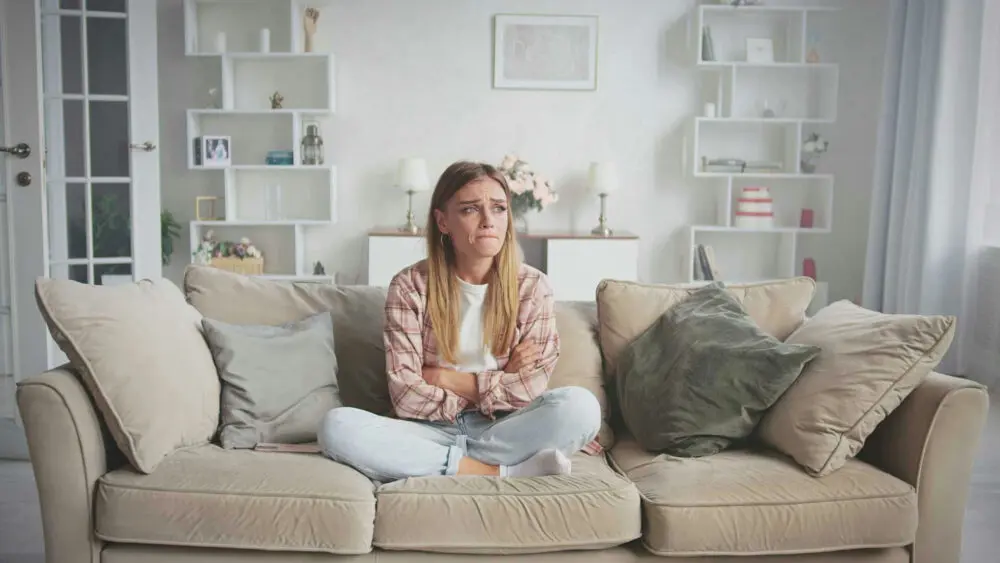 Teen feeling anxious before going to school due to social anxiety.