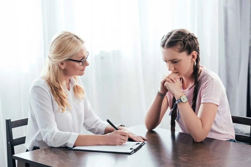 Adolescent participating in supportive mental health therapy session