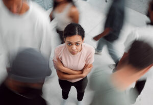teen girl in a crowd thinking about borderline personality disorder treatment