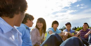 a group of teens in an outdoor setting