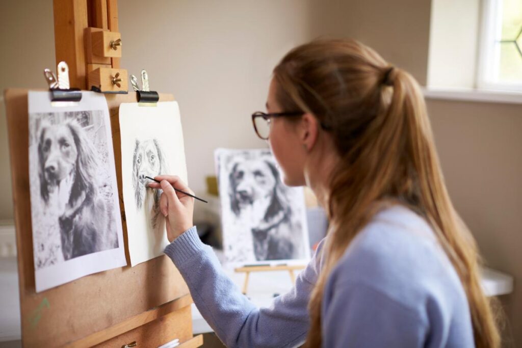 Woman draws as part of her art trauma therapy