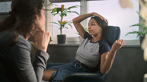 teen laying on couch discussing bipolar disorder treatment