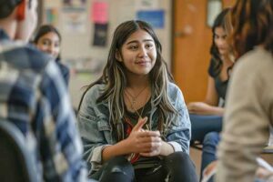 Teen talks about anxiety coping skills with other teens