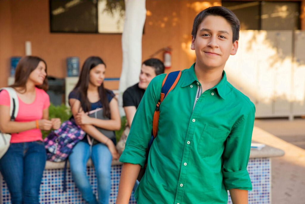 happy teen boy who is thriving from IOP or PHP treatment