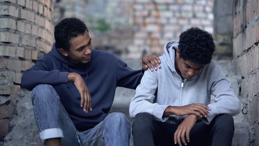 Parent noticing behavioral changes in their teenager, a warning sign of co-occurring anxiety and addiction.