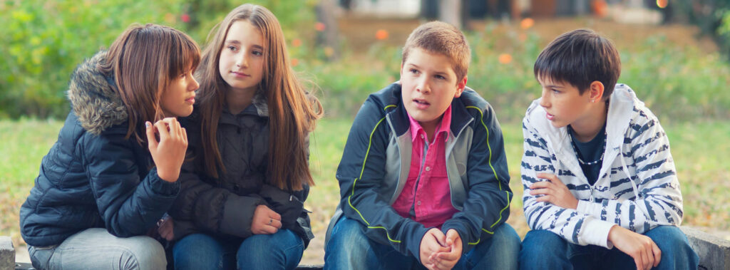 Group of teens supporting each other while coping with stress.