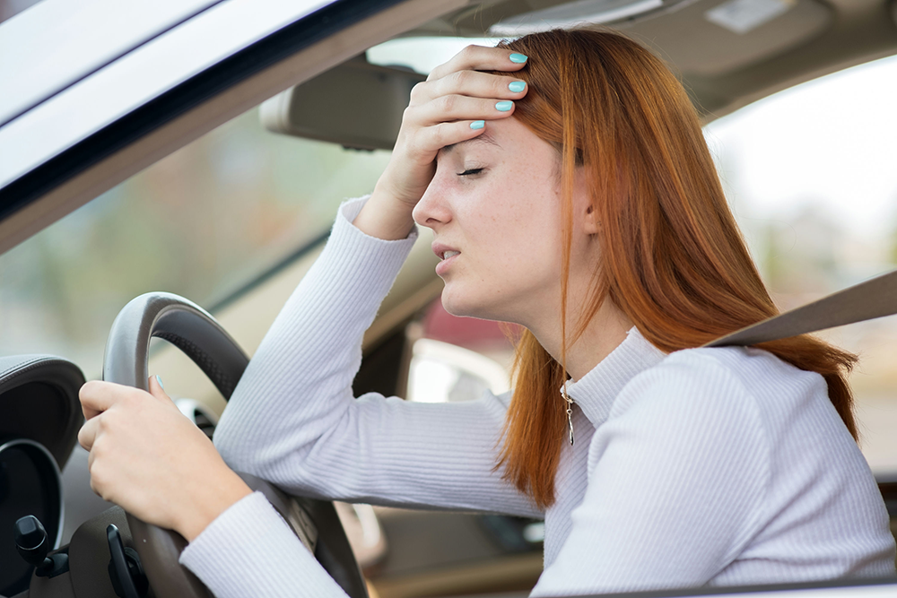 Teen experiencing emotional distress, a common sign of a mental health crisis.