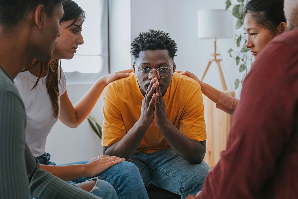 Adolescents participating in group therapy session at MCAW as part of evidence-based treatment for bipolar and addiction.