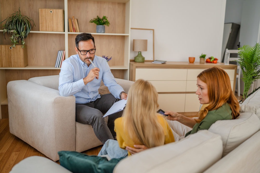 teen and parent with mental health therapist at our North Shore Lynnfield location teen and parent with mental health therapist at our North Shore Lynnfield location