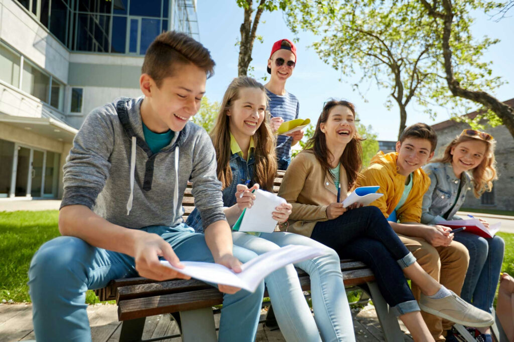 Teenagers receiving compassionate teen mental health treatment in a supportive therapeutic environment