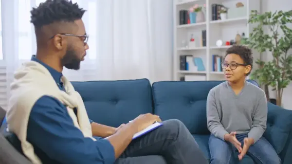 Compassionate PTSD therapy with teen girl
